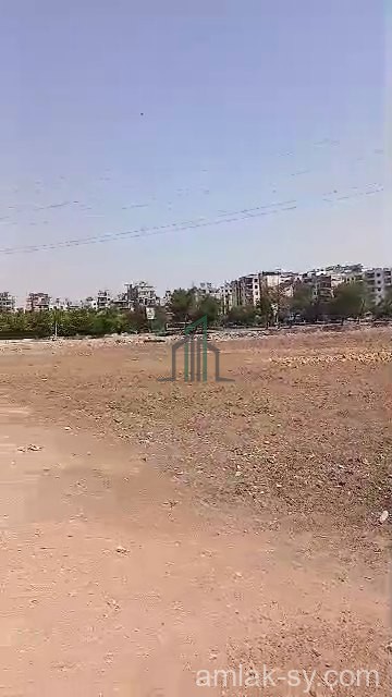 أرض 10 دنم قبل الجسر الاول على طريق المطار للبيع (766)